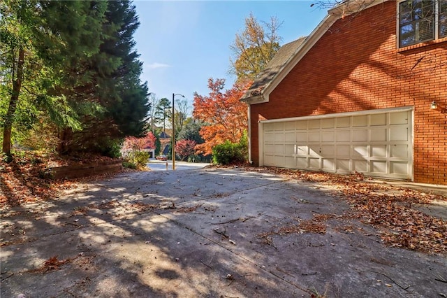 view of home's exterior with a garage