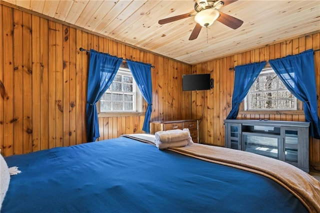 unfurnished bedroom with ceiling fan and wood ceiling