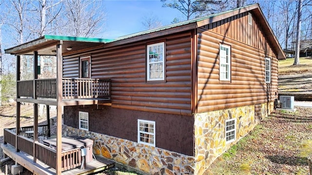 view of home's exterior featuring central AC unit