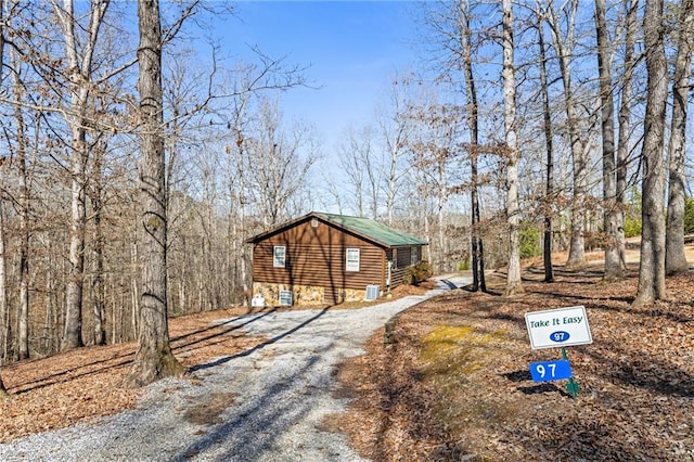 ranch-style home with an outbuilding