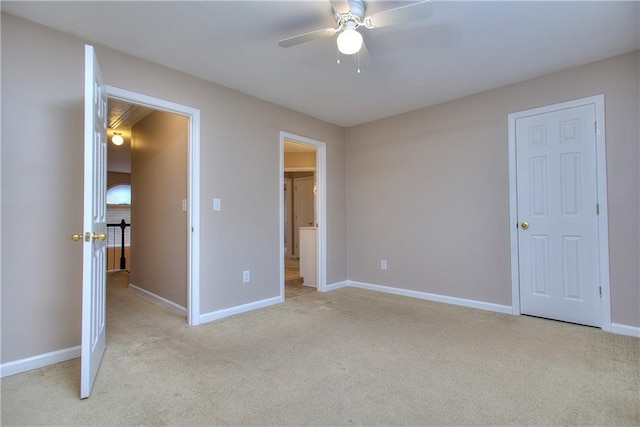 unfurnished bedroom featuring ceiling fan and light carpet