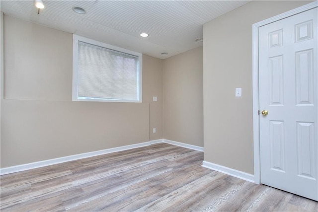 empty room with light wood-type flooring