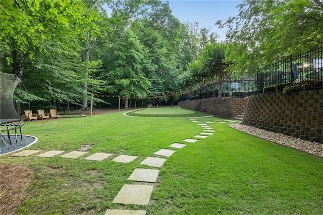 view of yard featuring a trampoline