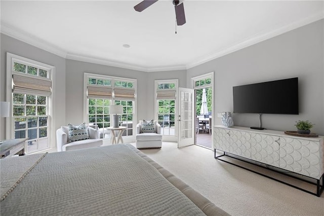 carpeted bedroom featuring french doors, ceiling fan, crown molding, and access to exterior