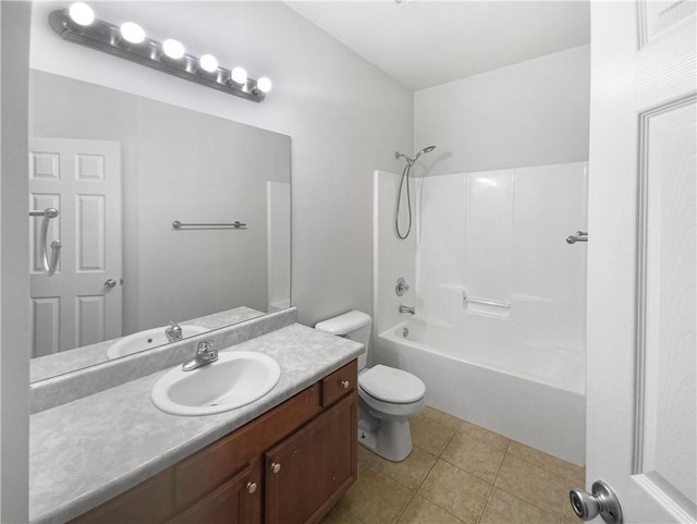 full bathroom featuring tub / shower combination, vanity, tile patterned flooring, and toilet