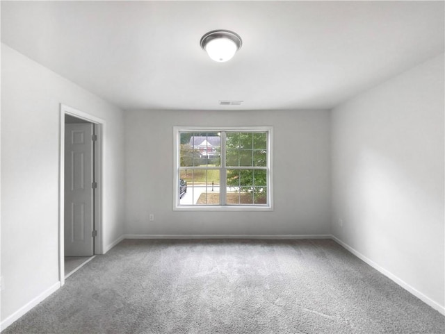 empty room featuring carpet floors