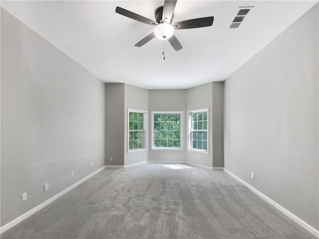 carpeted empty room with ceiling fan