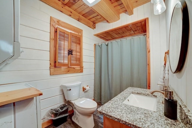 369 Trillium Rd, Suches, GA 30572 - bathroom with wooden ceiling with exposed beams, vanity, toilet, wood walls, and a shower with shower curtain