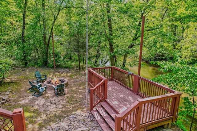 369 Trillium Rd, Suches, GA 30572 - wooden deck with a fire pit and a forest view