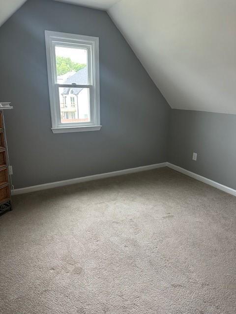 280 Ridge Bluff Ln, Suwanee, GA 30024 - bonus room featuring lofted ceiling, carpet flooring, and baseboards