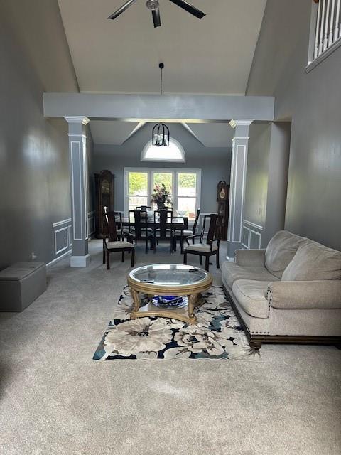 280 Ridge Bluff Ln, Suwanee, GA 30024 - living area with a ceiling fan, decorative columns, and carpet floors