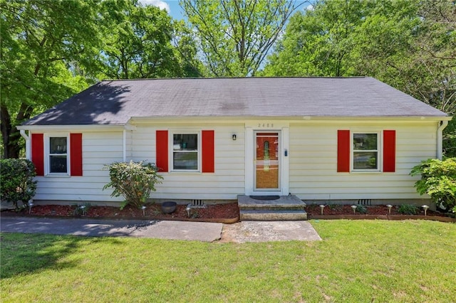 ranch-style home with crawl space and a front yard