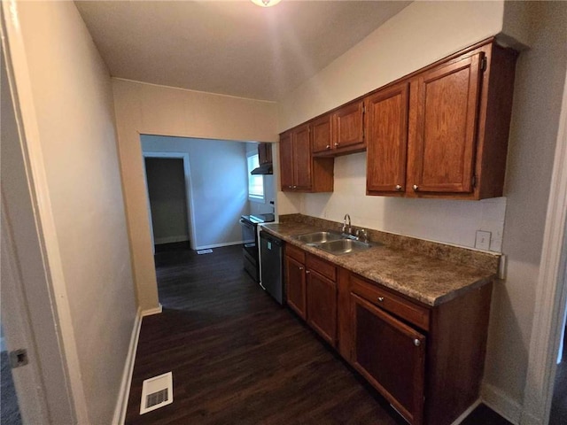 kitchen featuring visible vents, electric range, a sink, dark countertops, and wall chimney exhaust hood