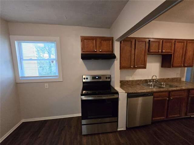 kitchen with dark hardwood / wood-style flooring, sink, and appliances with stainless steel finishes