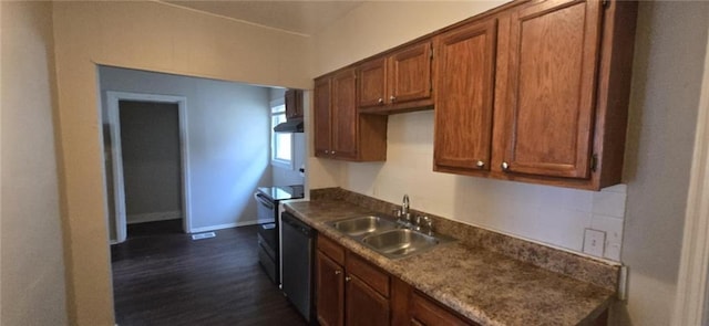 kitchen featuring brown cabinets, range with electric cooktop, a sink, dark wood finished floors, and baseboards