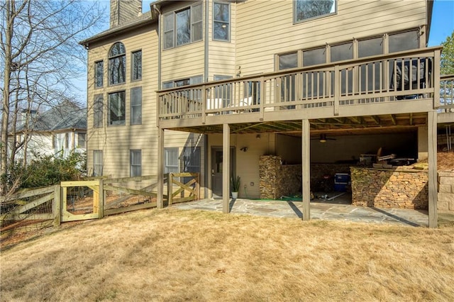 rear view of property with a patio area and a deck