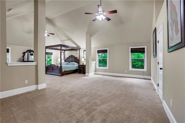 unfurnished bedroom with high vaulted ceiling, light carpet, and ceiling fan