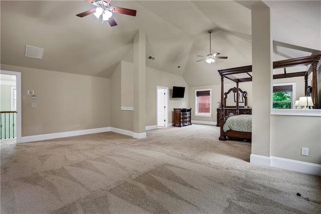 unfurnished bedroom featuring carpet and high vaulted ceiling