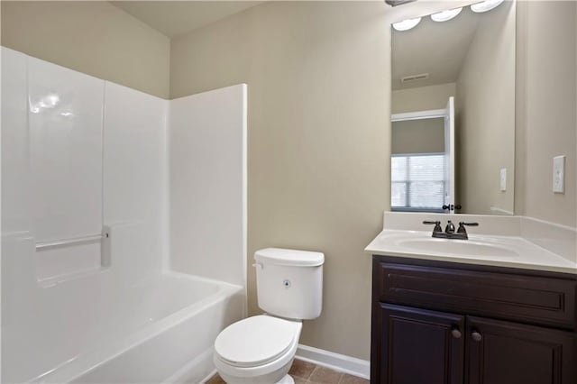 full bathroom with tile patterned flooring, shower / bath combination, vanity, and toilet