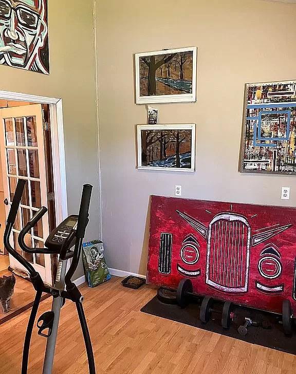 workout room featuring hardwood / wood-style floors