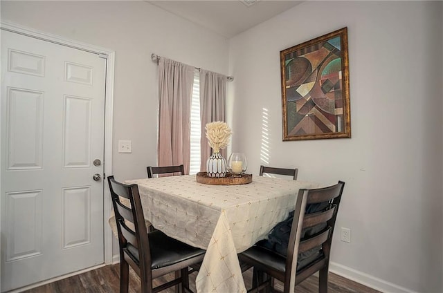 dining room featuring dark hardwood / wood-style flooring