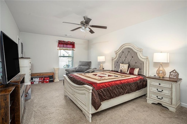 bedroom featuring ceiling fan and light colored carpet