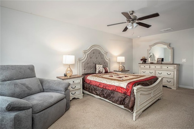 bedroom featuring ceiling fan and light colored carpet