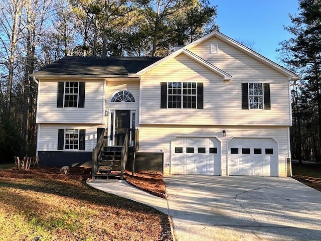 split foyer home featuring a garage