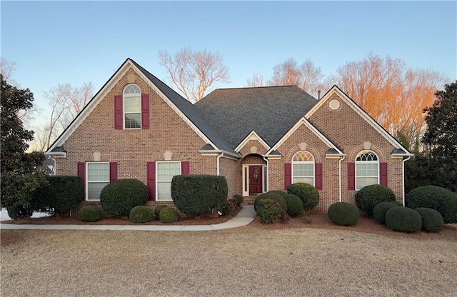 traditional home with brick siding