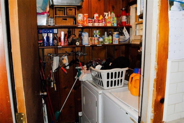 washroom with washing machine and dryer