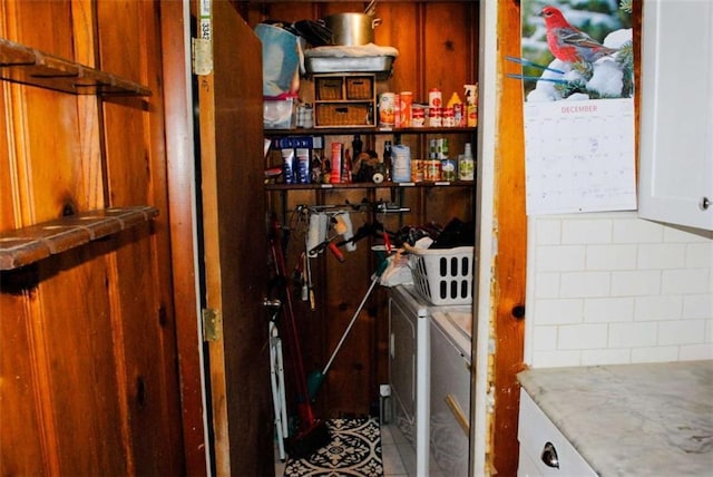 pantry with independent washer and dryer