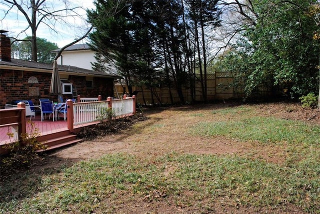 view of yard featuring a deck