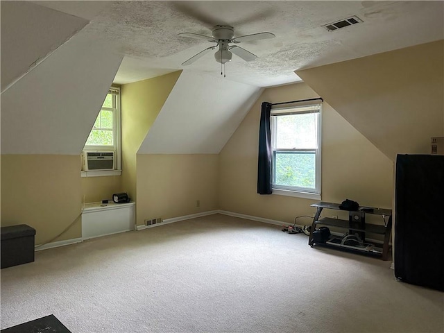bonus room featuring baseboards, carpet, and visible vents