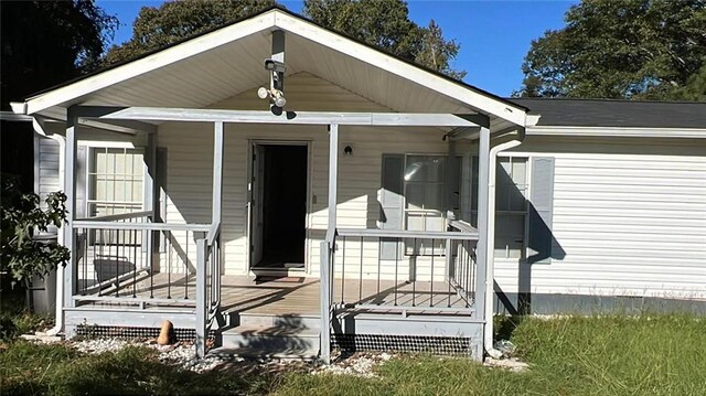 doorway to property with covered porch