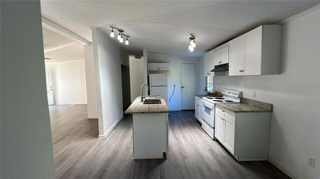 kitchen with white cabinetry, a kitchen island with sink, wood-type flooring, lofted ceiling with beams, and white appliances