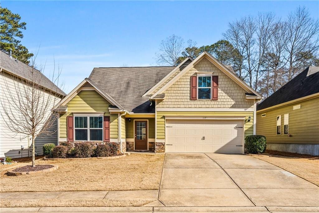 craftsman house featuring a garage