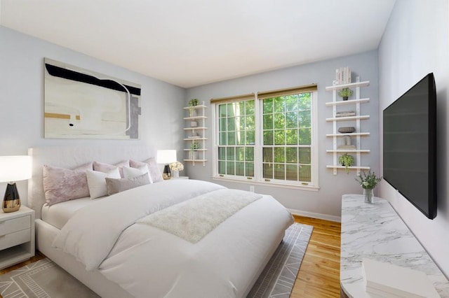 bedroom featuring hardwood / wood-style floors