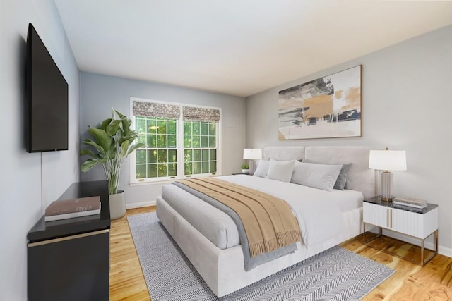 bedroom featuring hardwood / wood-style floors