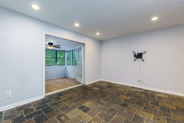 unfurnished room featuring ceiling fan