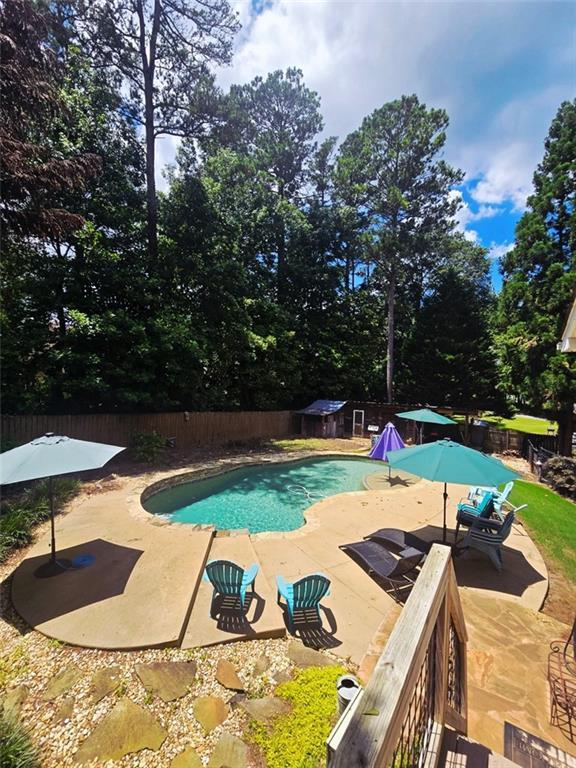60 Stonehedge Dr, Buford, GA 30518 - view of pool featuring a patio and a fenced backyard