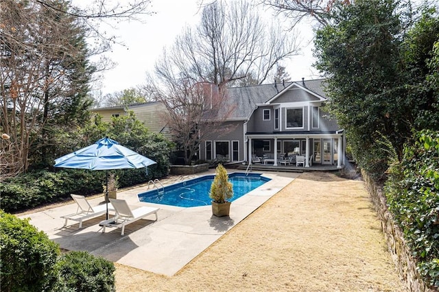 pool with a patio