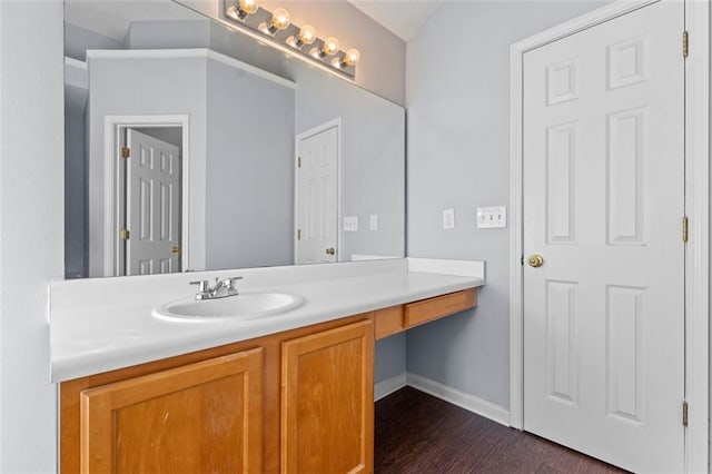 bathroom with vanity and hardwood / wood-style flooring