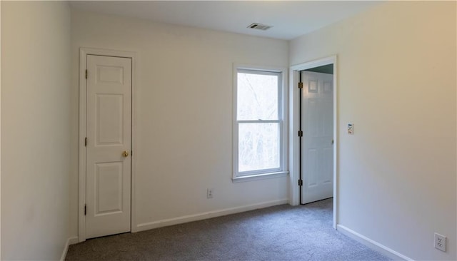 5150 Rockford Ln, Stockbridge, GA 30281 - carpeted spare room with visible vents, baseboards, and plenty of natural light
