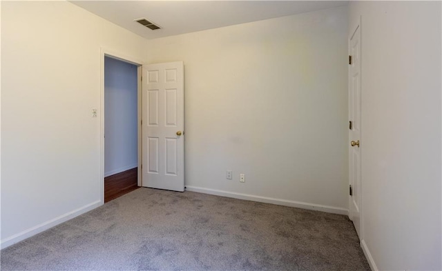 5150 Rockford Ln, Stockbridge, GA 30281 - carpeted empty room featuring visible vents and baseboards