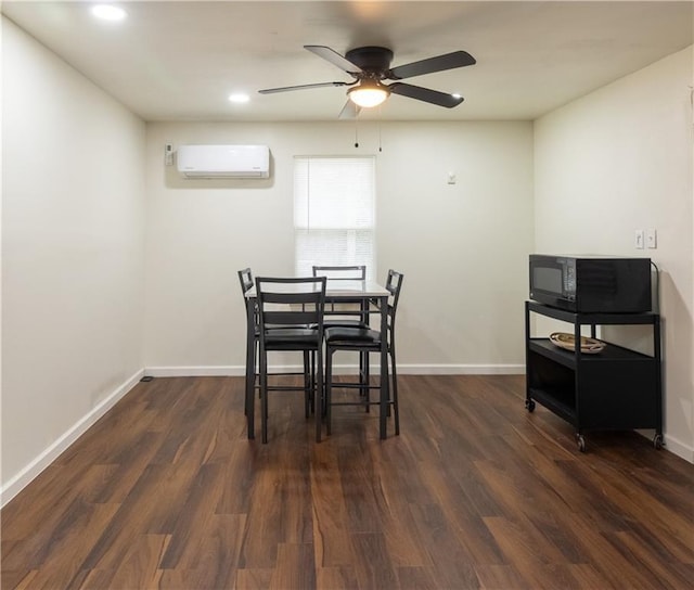 5150 Rockford Ln, Stockbridge, GA 30281 - dining space with a wall mounted air conditioner, baseboards, wood finished floors, and ceiling fan