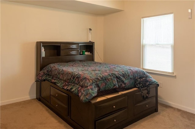 5150 Rockford Ln, Stockbridge, GA 30281 - bedroom with light colored carpet and baseboards