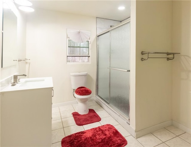 5150 Rockford Ln, Stockbridge, GA 30281 - full bath featuring a shower stall, vanity, toilet, tile patterned floors, and baseboards