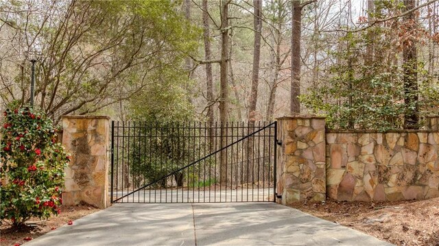 5150 Rockford Ln, Stockbridge, GA 30281 - view of gate featuring fence