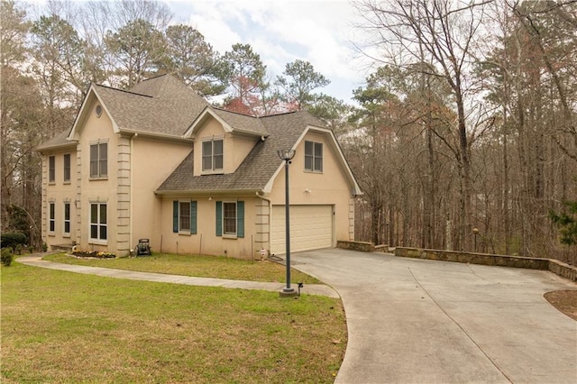 5150 Rockford Ln, Stockbridge, GA 30281 - view of front of home with a shingled roof, stucco siding, and a front lawn
