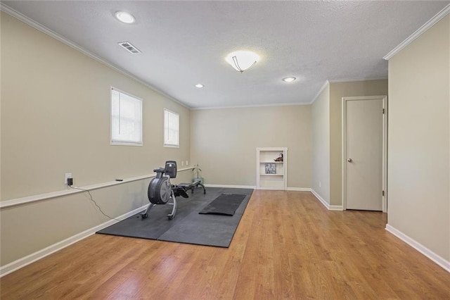 3916 S Martin Way, Lithia Springs, GA 30122 - exercise area featuring baseboards, ornamental molding, wood finished floors, and recessed lighting